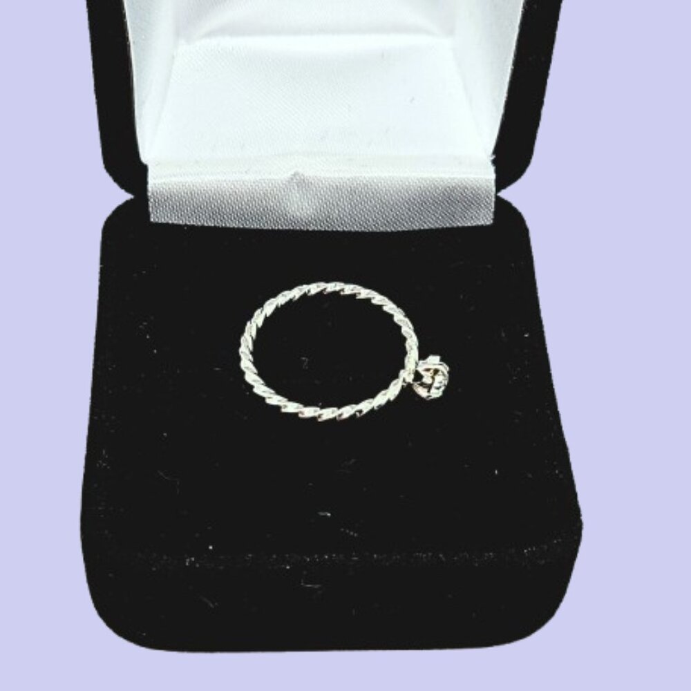 Beautiful Faux Solitaire Diamond with Silver Tone Twisted Band Size 5